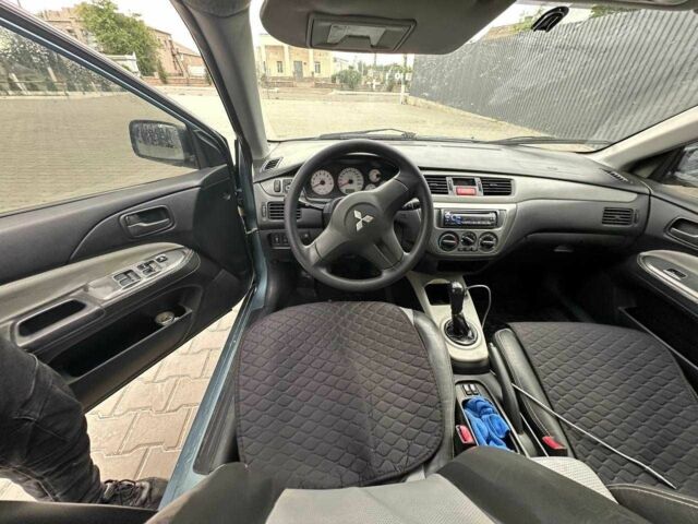 Зеленый Мицубиси Лансер, объемом двигателя 1.6 л и пробегом 300 тыс. км за 3800 $, фото 15 на Automoto.ua