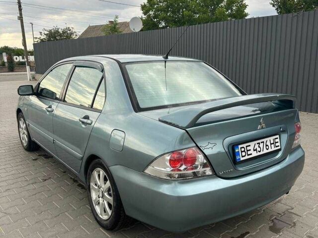 Зеленый Мицубиси Лансер, объемом двигателя 1.6 л и пробегом 300 тыс. км за 3800 $, фото 8 на Automoto.ua