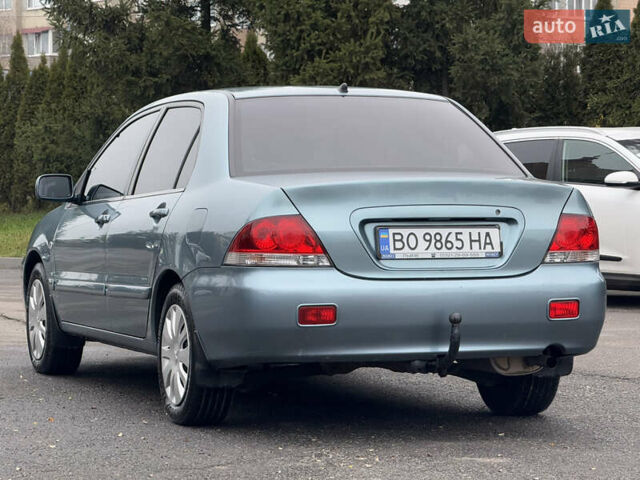 Зеленый Мицубиси Лансер, объемом двигателя 1.6 л и пробегом 214 тыс. км за 4150 $, фото 4 на Automoto.ua