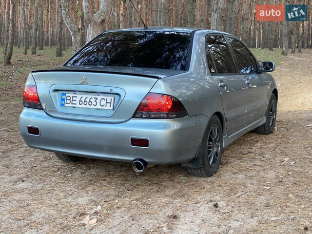 Зеленый Мицубиси Лансер, объемом двигателя 1.6 л и пробегом 260 тыс. км за 4500 $, фото 4 на Automoto.ua