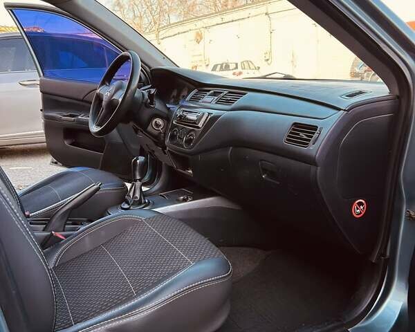 Зелений Міцубісі Lancer, об'ємом двигуна 1.6 л та пробігом 214 тис. км за 3800 $, фото 5 на Automoto.ua
