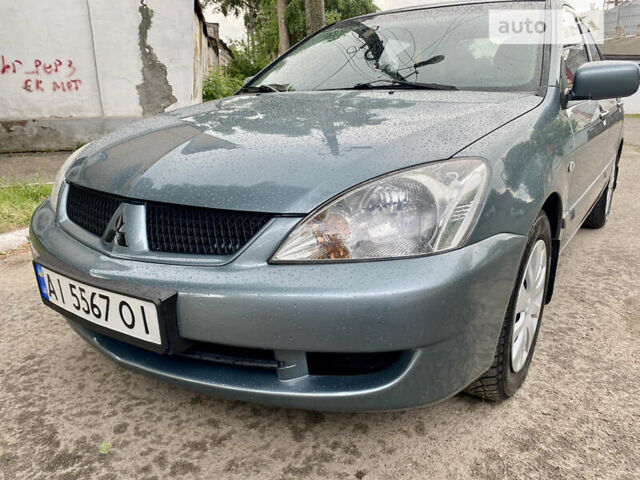 Зелений Міцубісі Lancer, об'ємом двигуна 1.6 л та пробігом 220 тис. км за 4750 $, фото 25 на Automoto.ua