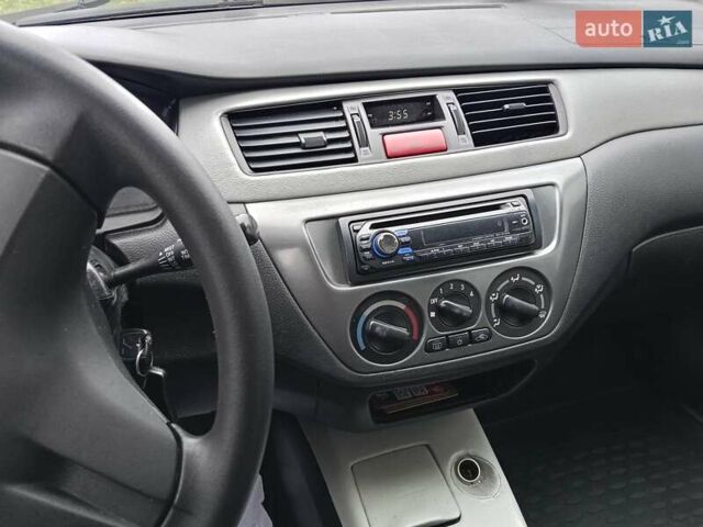 Зеленый Мицубиси Лансер, объемом двигателя 1.58 л и пробегом 300 тыс. км за 3999 $, фото 8 на Automoto.ua