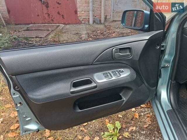 Зелений Міцубісі Lancer, об'ємом двигуна 1.6 л та пробігом 219 тис. км за 4700 $, фото 15 на Automoto.ua