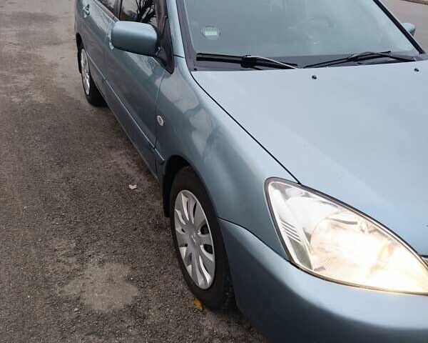 Зелений Міцубісі Lancer, об'ємом двигуна 1.6 л та пробігом 162 тис. км за 4700 $, фото 3 на Automoto.ua