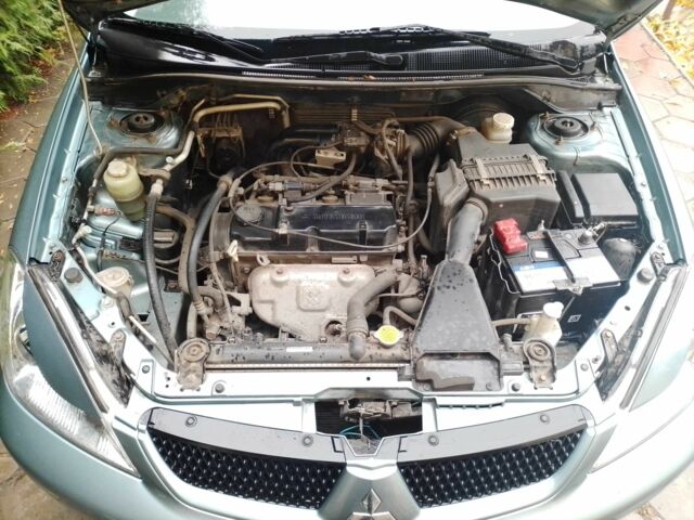 Зелений Міцубісі Lancer, об'ємом двигуна 1.6 л та пробігом 96 тис. км за 5200 $, фото 11 на Automoto.ua