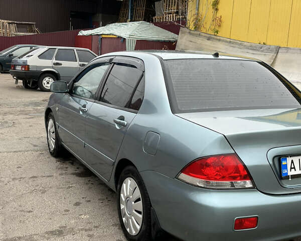 Мицубиси Лансер 2007 в Чернигове на Automoto.ua Зеленый Мицубиси Лансер, объемом двигателя 1.6 л и пробегом 247 тыс. км за 4200 $, фото 1 на Automoto.ua