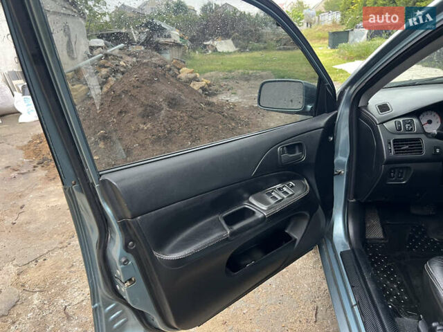 Зелений Міцубісі Lancer, об'ємом двигуна 1.6 л та пробігом 217 тис. км за 5400 $, фото 9 на Automoto.ua