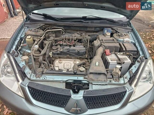 Зелений Міцубісі Lancer, об'ємом двигуна 1.6 л та пробігом 219 тис. км за 4700 $, фото 2 на Automoto.ua