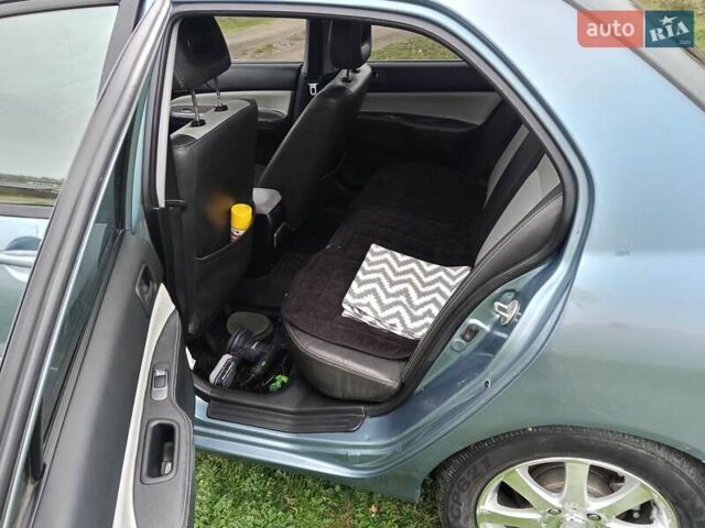 Зеленый Мицубиси Лансер, объемом двигателя 1.58 л и пробегом 300 тыс. км за 3999 $, фото 4 на Automoto.ua