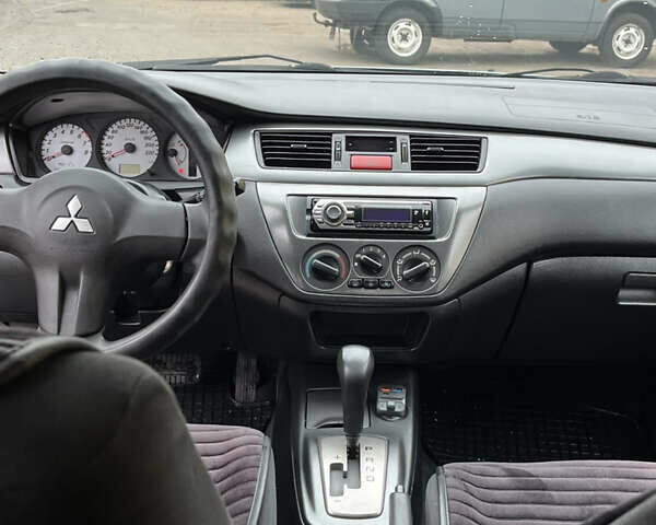 Мицубиси Лансер 2007 в Чернигове на Automoto.ua Зеленый Мицубиси Лансер, объемом двигателя 1.6 л и пробегом 247 тыс. км за 4200 $, фото 4 на Automoto.ua