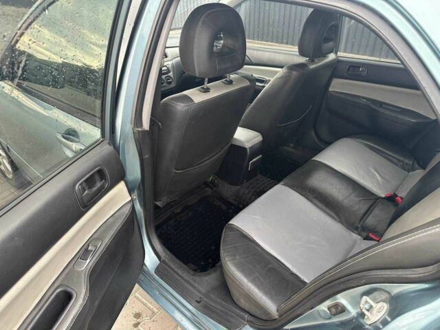 Зеленый Мицубиси Лансер, объемом двигателя 1.6 л и пробегом 300 тыс. км за 3800 $, фото 11 на Automoto.ua