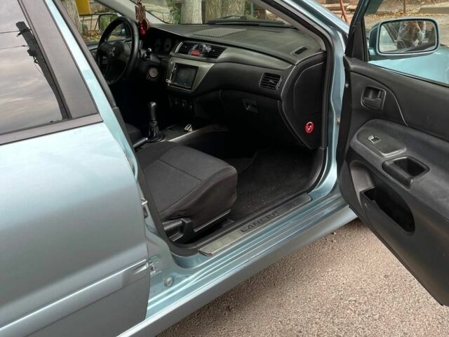 Зеленый Мицубиси Лансер, объемом двигателя 1.6 л и пробегом 255 тыс. км за 4000 $, фото 2 на Automoto.ua