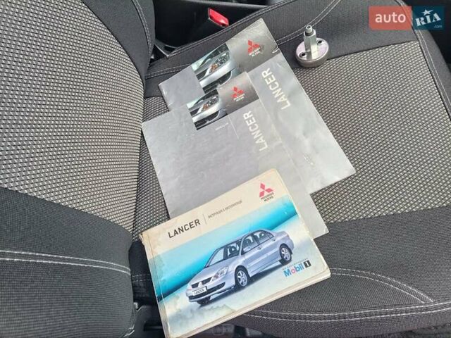 Зеленый Мицубиси Лансер, объемом двигателя 1.6 л и пробегом 219 тыс. км за 5300 $, фото 24 на Automoto.ua