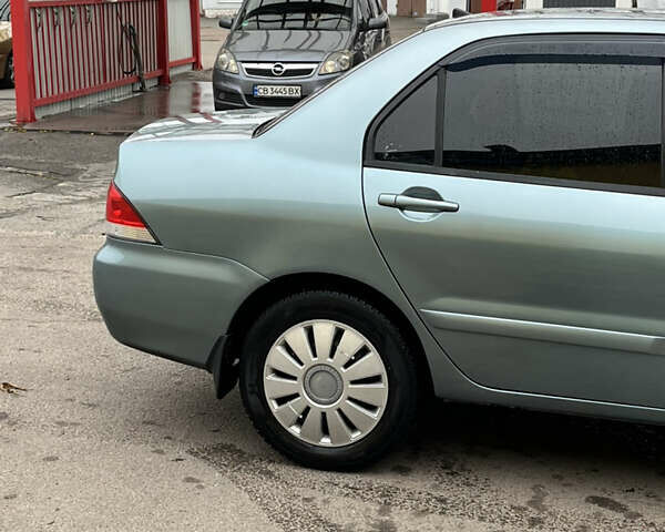 Мицубиси Лансер 2007 в Чернигове на Automoto.ua Зеленый Мицубиси Лансер, объемом двигателя 1.6 л и пробегом 247 тыс. км за 4200 $, фото 3 на Automoto.ua