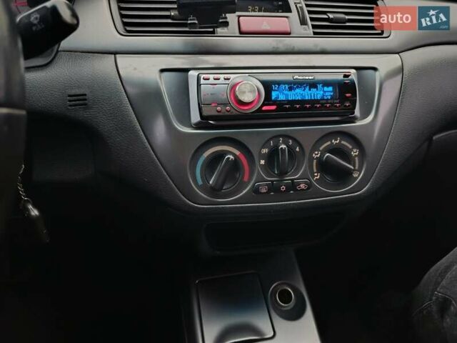 Зелений Міцубісі Lancer, об'ємом двигуна 1.6 л та пробігом 162 тис. км за 4700 $, фото 15 на Automoto.ua