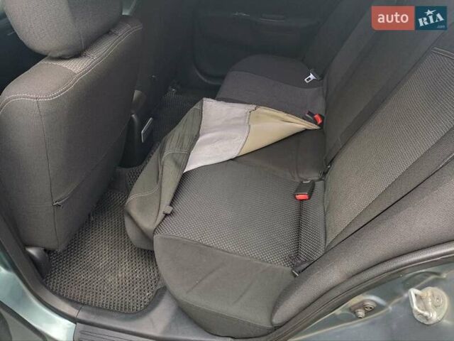 Зелений Міцубісі Lancer, об'ємом двигуна 1.6 л та пробігом 219 тис. км за 4700 $, фото 10 на Automoto.ua