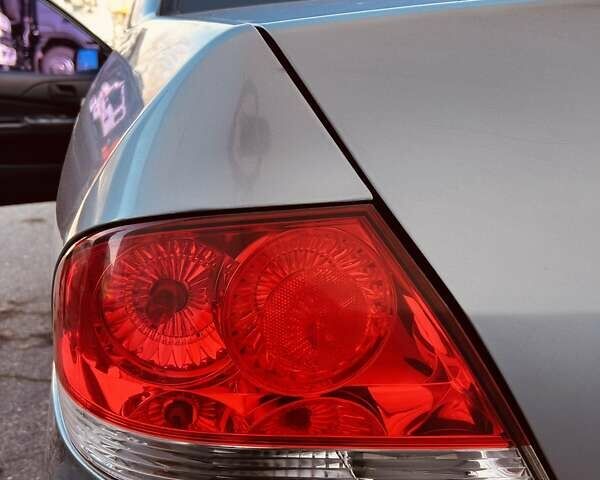 Зелений Міцубісі Lancer, об'ємом двигуна 1.6 л та пробігом 214 тис. км за 3800 $, фото 11 на Automoto.ua