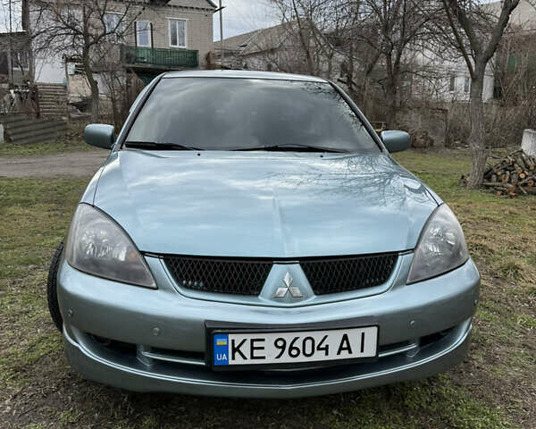Зелений Міцубісі Lancer, об'ємом двигуна 2 л та пробігом 225 тис. км за 5599 $, фото 4 на Automoto.ua