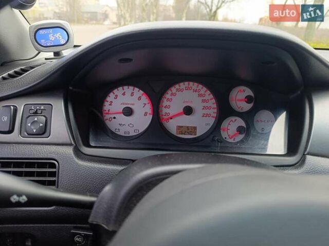 Зелений Міцубісі Lancer, об'ємом двигуна 1.6 л та пробігом 162 тис. км за 4700 $, фото 14 на Automoto.ua