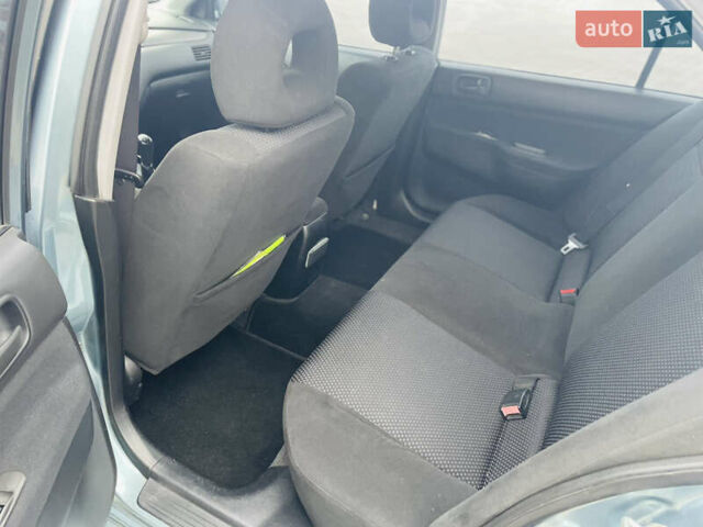 Зеленый Мицубиси Лансер, объемом двигателя 1.6 л и пробегом 164 тыс. км за 5000 $, фото 7 на Automoto.ua