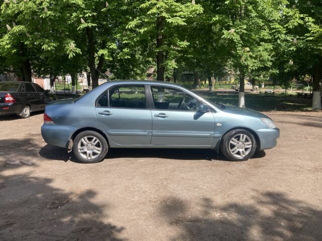 Зелений Міцубісі Lancer, об'ємом двигуна 0.16 л та пробігом 262 тис. км за 4600 $, фото 1 на Automoto.ua