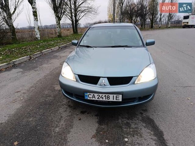 Зелений Міцубісі Lancer, об'ємом двигуна 1.6 л та пробігом 162 тис. км за 4700 $, фото 2 на Automoto.ua