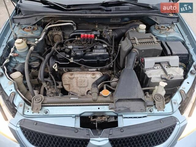 Зелений Міцубісі Lancer, об'ємом двигуна 1.6 л та пробігом 162 тис. км за 4700 $, фото 13 на Automoto.ua