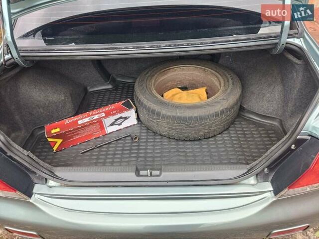 Зеленый Мицубиси Лансер, объемом двигателя 1.6 л и пробегом 219 тыс. км за 5300 $, фото 22 на Automoto.ua