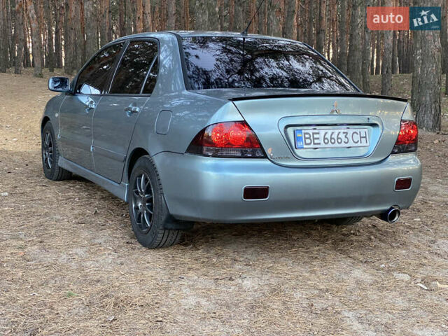 Зеленый Мицубиси Лансер, объемом двигателя 1.6 л и пробегом 260 тыс. км за 4500 $, фото 3 на Automoto.ua