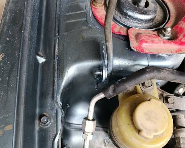 Зелений Міцубісі Lancer, об'ємом двигуна 2 л та пробігом 238 тис. км за 2999 $, фото 6 на Automoto.ua