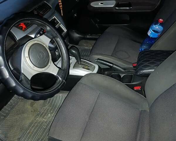 Зелений Міцубісі Lancer, об'ємом двигуна 2 л та пробігом 238 тис. км за 2999 $, фото 8 на Automoto.ua
