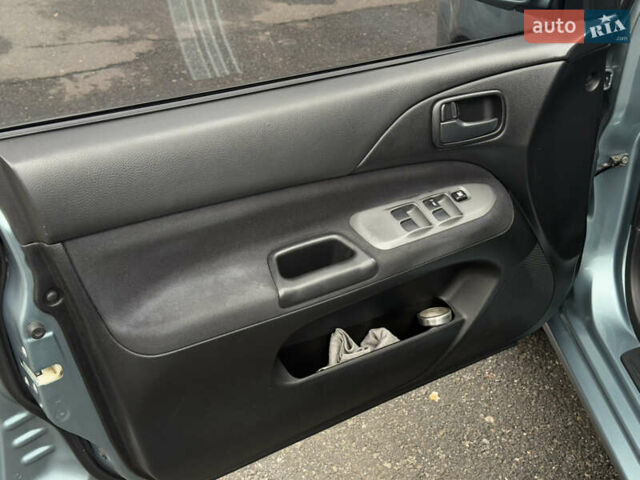 Зеленый Мицубиси Лансер, объемом двигателя 1.6 л и пробегом 214 тыс. км за 4150 $, фото 28 на Automoto.ua