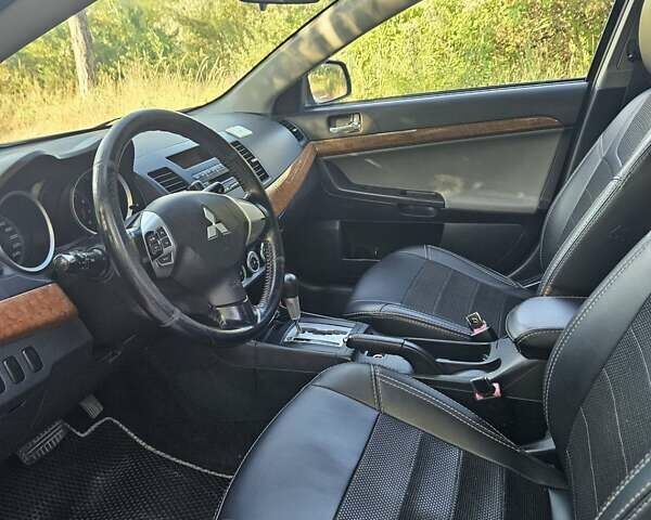 Зелений Міцубісі Lancer, об'ємом двигуна 1.47 л та пробігом 215 тис. км за 5000 $, фото 21 на Automoto.ua