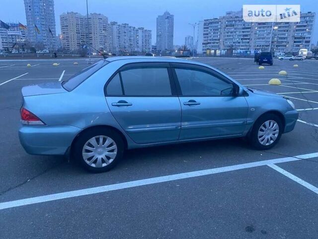 Зелений Міцубісі Lancer, об'ємом двигуна 1.6 л та пробігом 325 тис. км за 4200 $, фото 7 на Automoto.ua