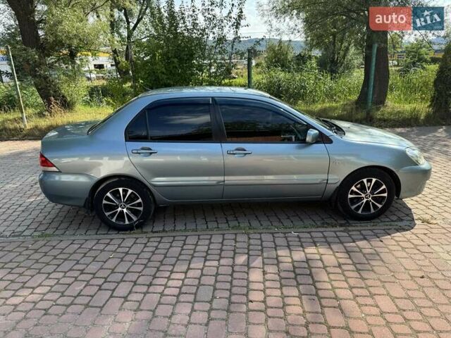 Зеленый Мицубиси Лансер, объемом двигателя 1.6 л и пробегом 137 тыс. км за 5500 $, фото 11 на Automoto.ua