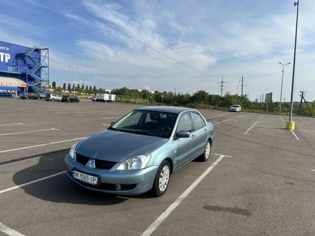 Зелений Міцубісі Lancer, об'ємом двигуна 1.6 л та пробігом 255 тис. км за 3800 $, фото 3 на Automoto.ua