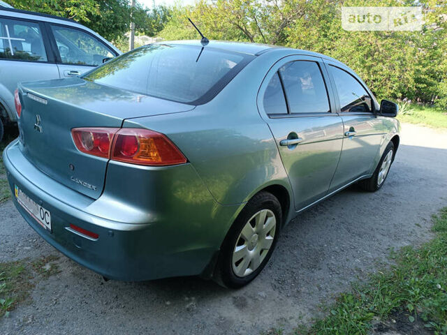 Зелений Міцубісі Lancer, об'ємом двигуна 1.5 л та пробігом 141 тис. км за 7300 $, фото 4 на Automoto.ua