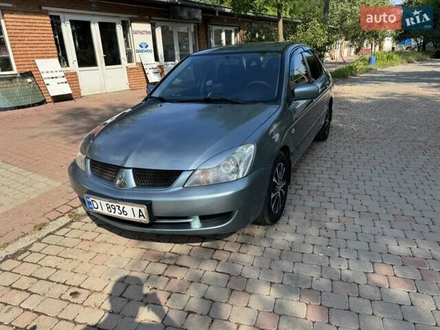 Зеленый Мицубиси Лансер, объемом двигателя 1.6 л и пробегом 137 тыс. км за 5500 $, фото 3 на Automoto.ua