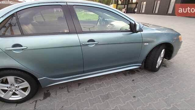 Зелений Міцубісі Lancer, об'ємом двигуна 2 л та пробігом 265 тис. км за 5100 $, фото 3 на Automoto.ua