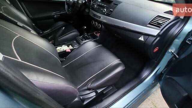 Зелений Міцубісі Lancer, об'ємом двигуна 2 л та пробігом 265 тис. км за 5100 $, фото 19 на Automoto.ua