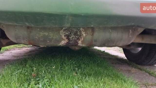 Зелений Міцубісі Lancer, об'ємом двигуна 2 л та пробігом 265 тис. км за 5100 $, фото 16 на Automoto.ua