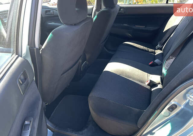 Зеленый Мицубиси Лансер, объемом двигателя 1.58 л и пробегом 180 тыс. км за 4800 $, фото 7 на Automoto.ua