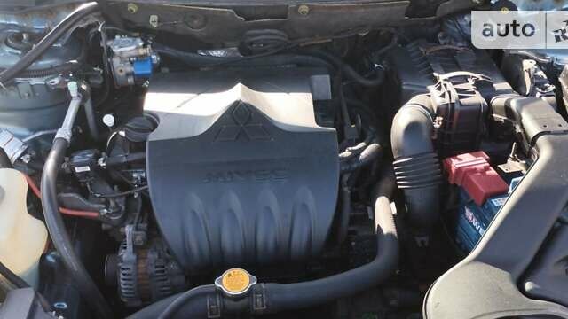 Зеленый Мицубиси Лансер, объемом двигателя 1.5 л и пробегом 174 тыс. км за 5599 $, фото 16 на Automoto.ua
