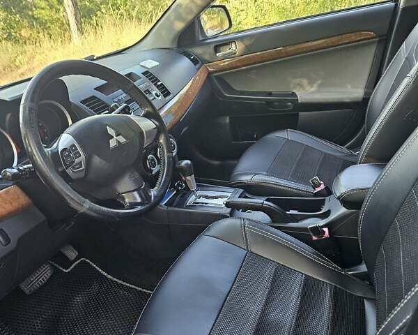 Зелений Міцубісі Lancer, об'ємом двигуна 1.47 л та пробігом 215 тис. км за 5000 $, фото 18 на Automoto.ua