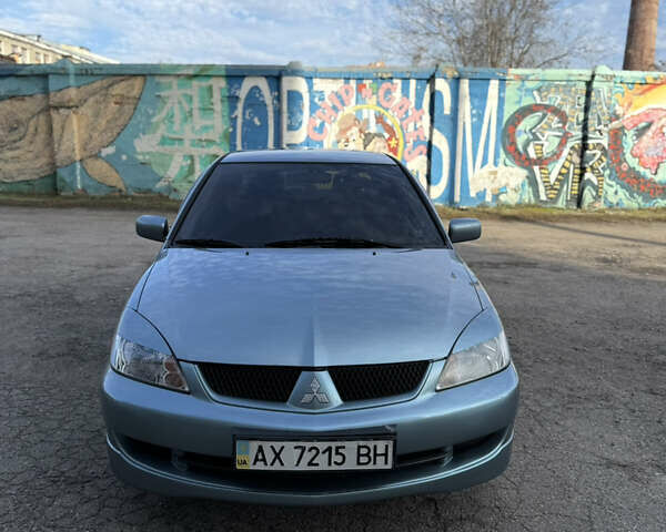 Зелений Міцубісі Lancer, об'ємом двигуна 1.6 л та пробігом 164 тис. км за 6000 $, фото 4 на Automoto.ua