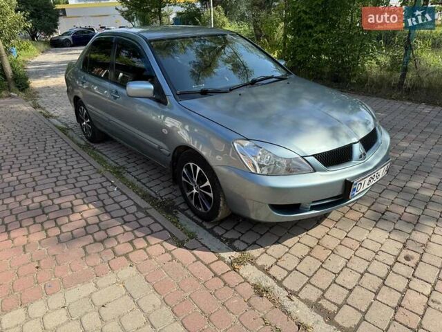 Зеленый Мицубиси Лансер, объемом двигателя 1.6 л и пробегом 137 тыс. км за 5500 $, фото 1 на Automoto.ua