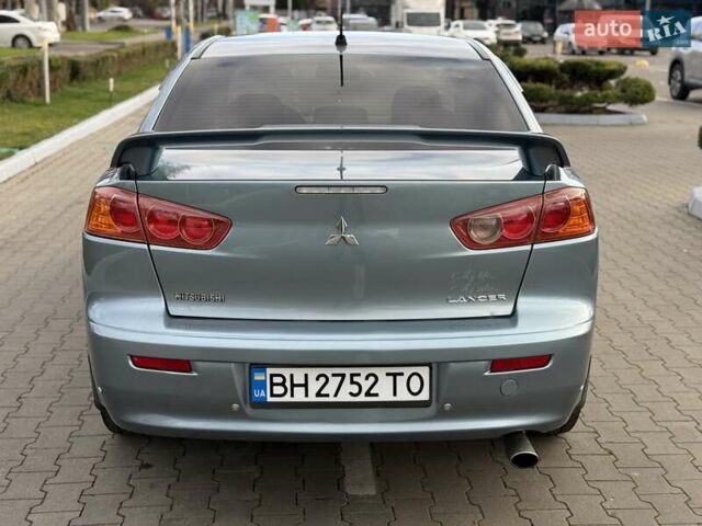 Зеленый Мицубиси Лансер, объемом двигателя 2 л и пробегом 177 тыс. км за 7200 $, фото 8 на Automoto.ua
