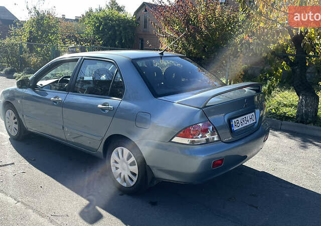 Зеленый Мицубиси Лансер, объемом двигателя 1.58 л и пробегом 180 тыс. км за 4800 $, фото 3 на Automoto.ua