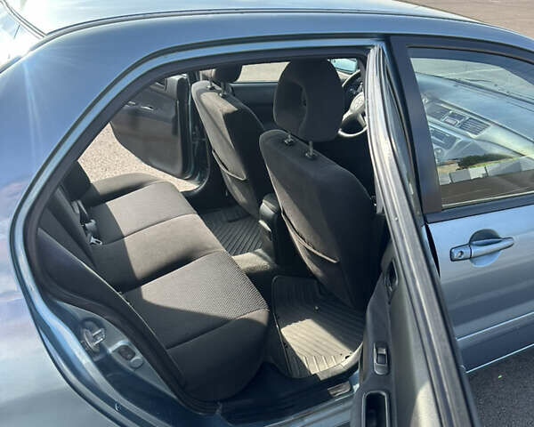 Зелений Міцубісі Lancer, об'ємом двигуна 1.58 л та пробігом 255 тис. км за 3700 $, фото 6 на Automoto.ua